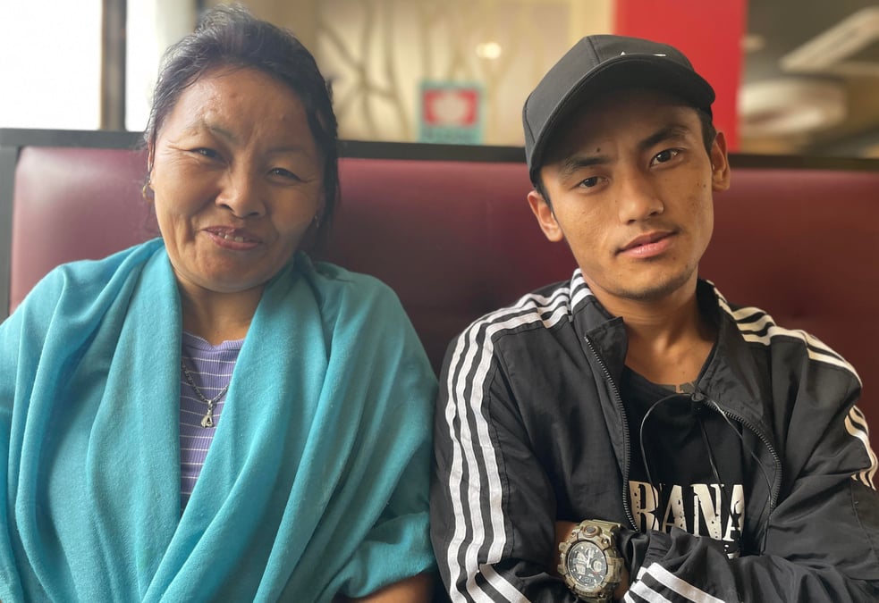 Tsering Lama with her son Pemba who was miraculously rescued from the rubble of an eight-storey building after being trapped for five days in Gongabu in the 2015 earthquake.