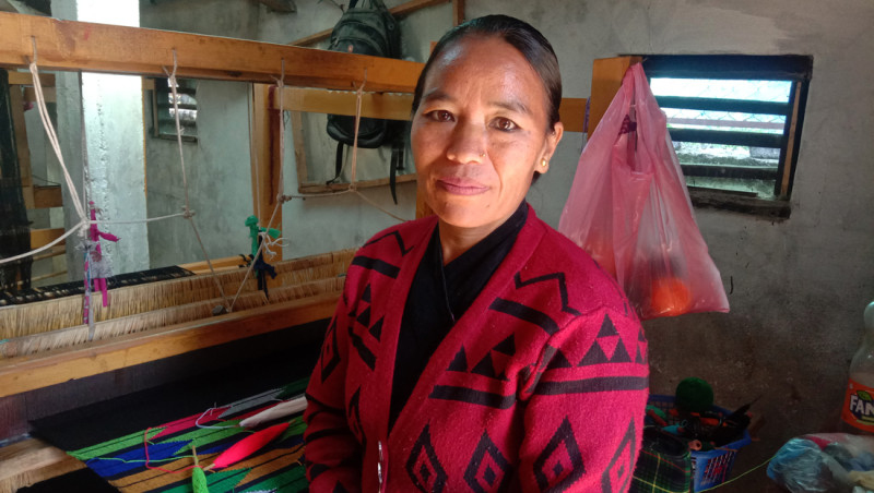 Niraka Gharti Magar at her weaving loom.