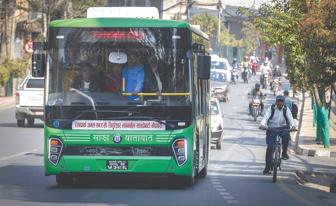 ECONOMIC POWER: An electric bus and bicycle lane in Lalitpur on Thursday morning. Reducing Nepal's petroleum import bill should be a priority for sustained growth. Photo: GOPEN RAI