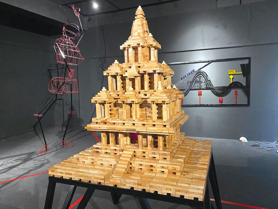 A model of the Krishna Mandir in Patan made using Jenga Blocks, representing the mythical 'Vraja' where the Rasa Lila takes place