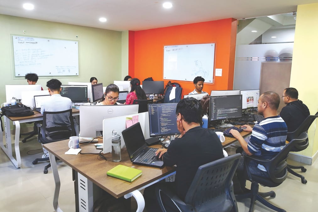 NATURAL INTELLIGENCE: Software engineers at work on Thursday in the Naxal office of the company Wiseyak, which primarily exports AI healthcare products. Photo: SUMAN NEPALI