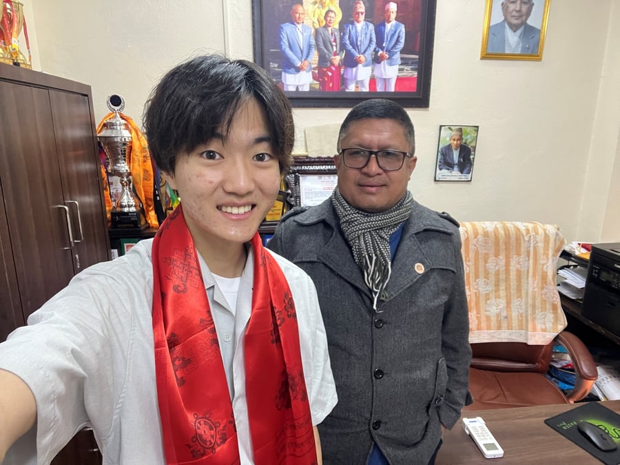 Ward Chair Rupendra Raj Shakya presented me with a red khata when I visited his office to locate the facility my grandfather had built 25 years ago in Patan.