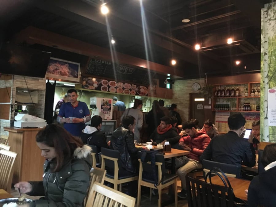 Rush Rush: Nepali students pack the Sakura Nepali restaurant in Shinjuku for a quick lunch. Photo: KUNDA DIXIT