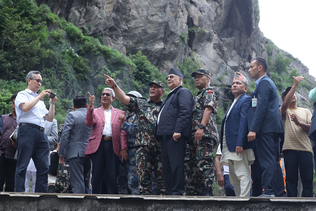 Chinese Ambassador Chen Song and Prime Minister K P Oli visited the Nepal-China border on Tuesday to inspect damages caused by the flood. Photo: RSS