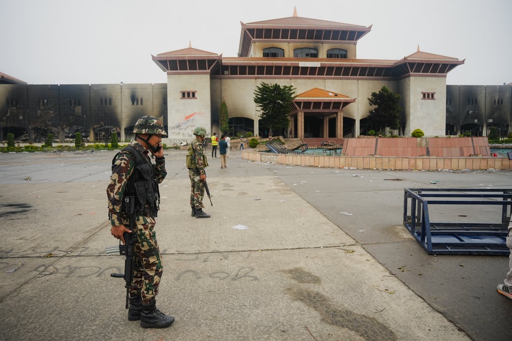 Nepal Army soldiers guarding what is left of the gutted Parliament building on Wednesday morning.