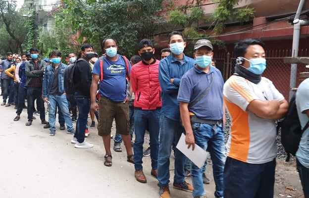 QR coded vaccine certificates in queue